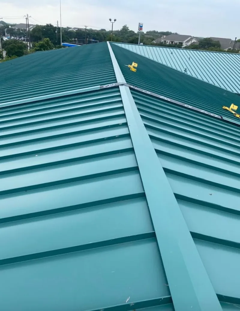 Green commercial metal roof ridge and valley for Metal Roof Repair in Withamsville